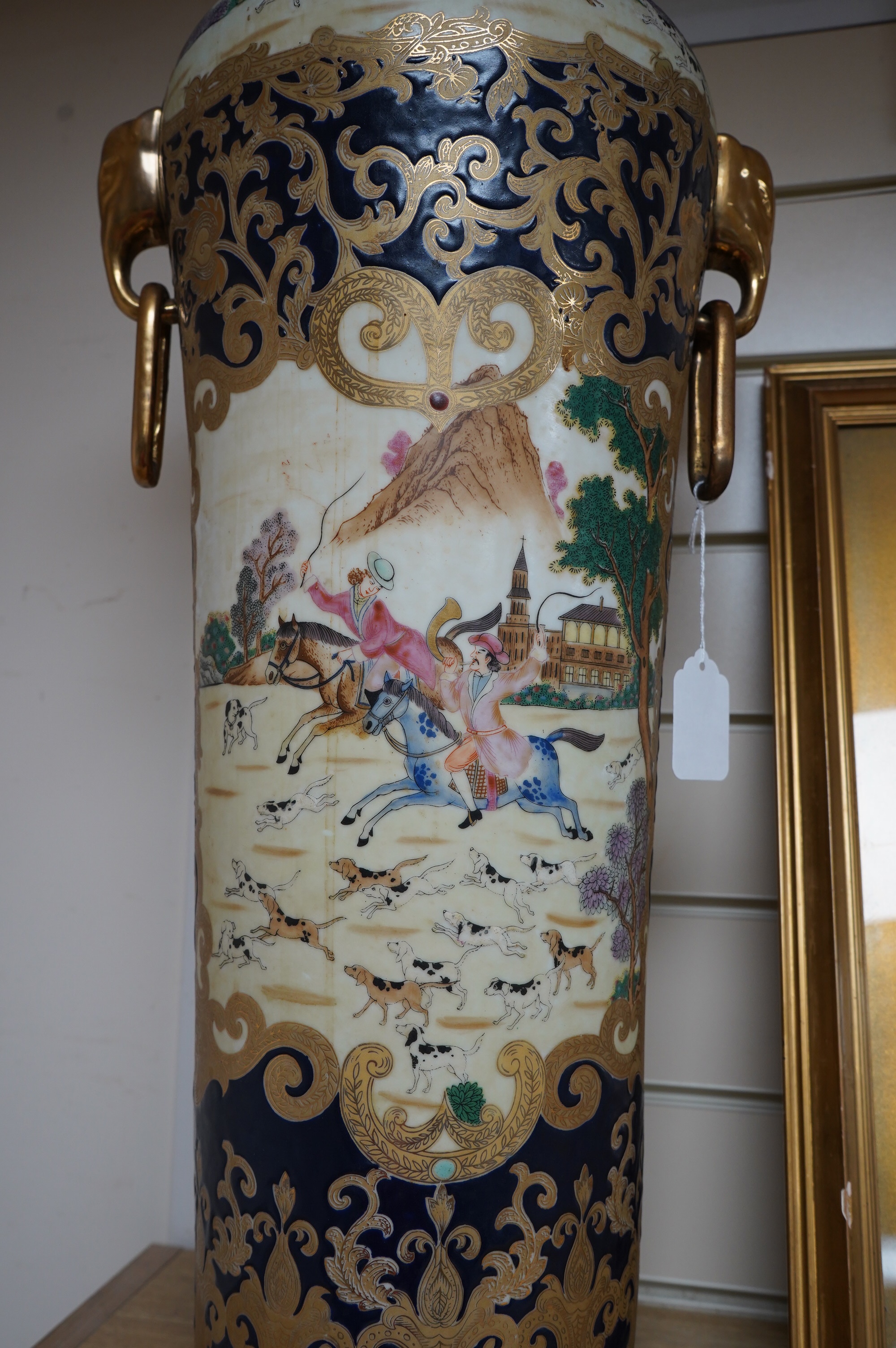 A 20th century Chinese vase decorated with figures on horseback, 63cm high. Condition - good